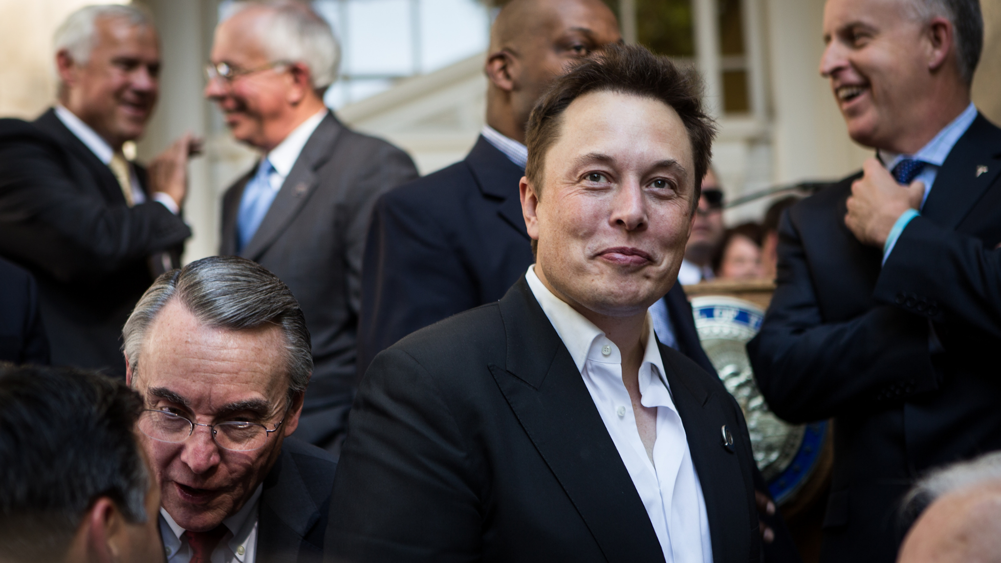 CARSON CITY, NEVADA- SEPTEMBER 4: Elon Musk, CEO of Tesla Motors, greets the audience after speaking at a press conference at the Nevada State Capitol, September 4, 2014 in Carson City, Nevada. Musk and Sandoval announced a plan to build a Tesla Gigafactory in Nevada to produce batteries for electric vehicles providing 6,500 jobs to the state.