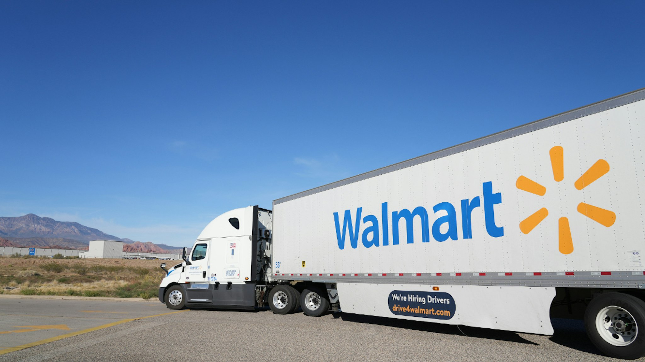 A truck enters a Walmart Distribution Center in Saint George, Utah, U.S., on Sunday, Nov. 14, 2021. Walmart Inc. is scheduled to release earnings figures on November 15.