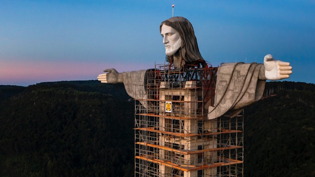 Aerial view of Christ The Protector Statue at sunrise on April 21, 2021 in Encantado, Brazil.
