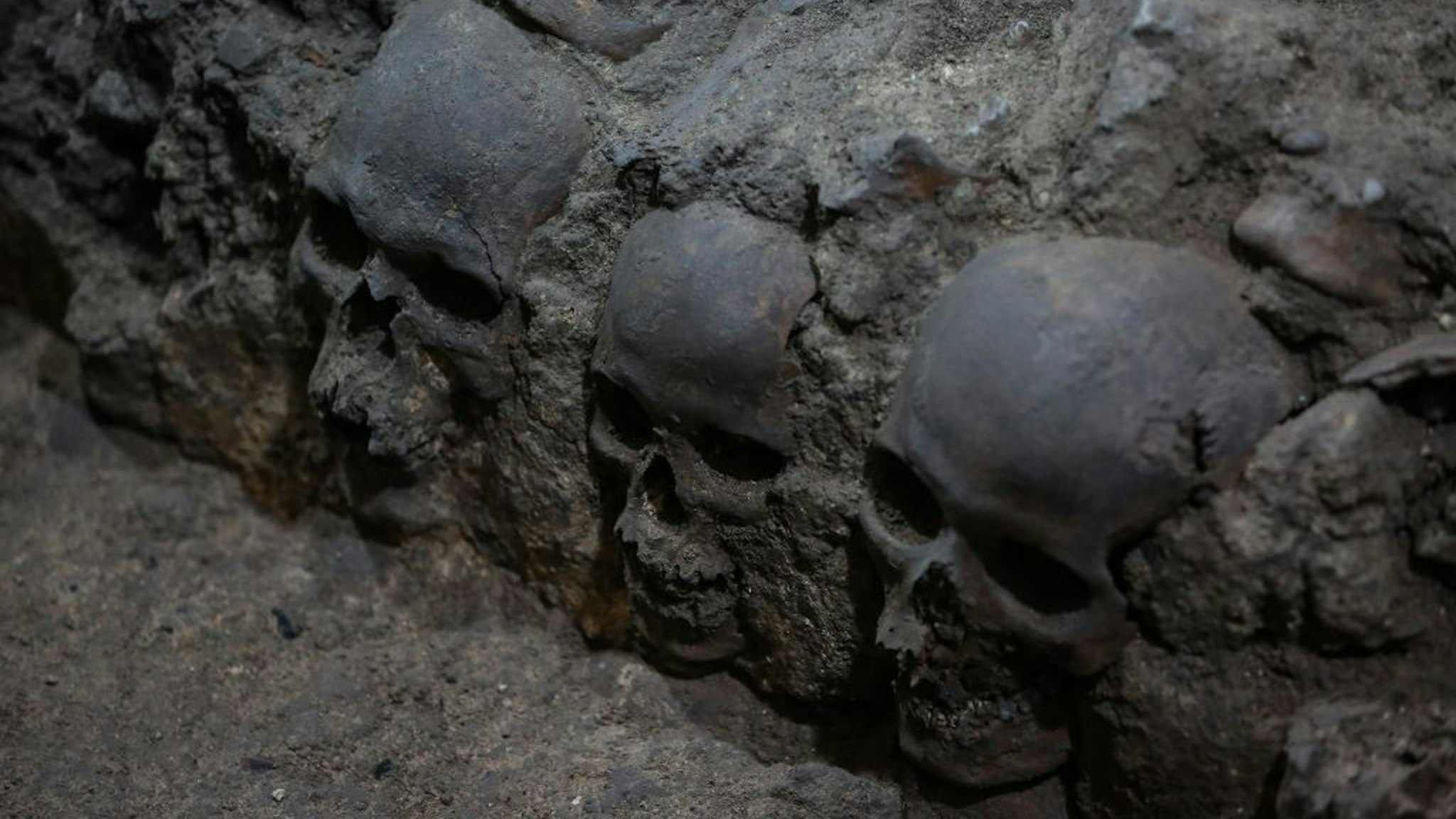 MEXICO CITY, MEXICO - JULY 10: Skulls, which were found during an excavation work, are seen within a cylindrical edifice in Mexico City, Mexico on July 10, 2017. More than 650 skulls and thousands of fragments were found near Templo Mayor, one of the main temples in the Aztec capital Tenochtitlan, which later became Mexico City. The discovery has raised new questions about the culture of sacrifice in the Aztec Empire.