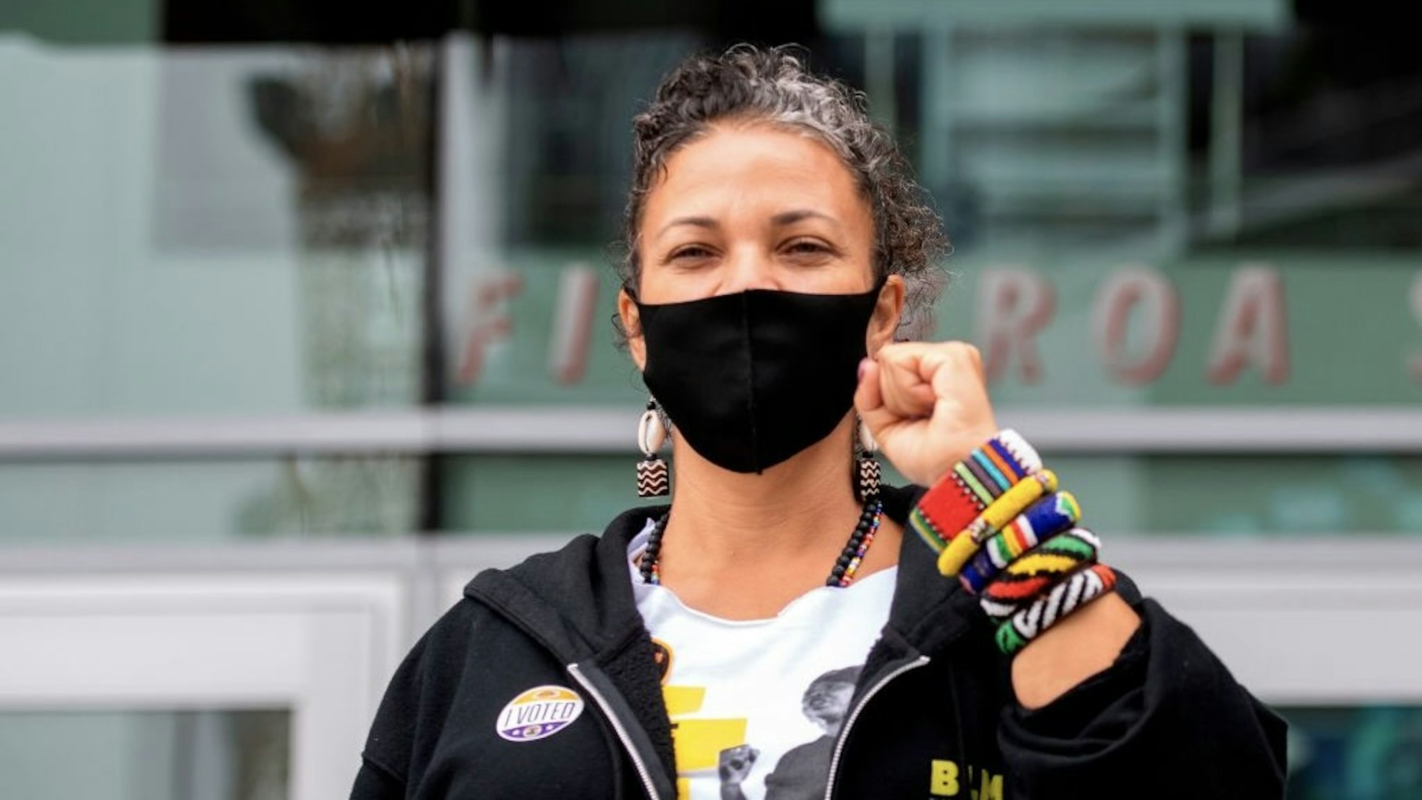 US-VOTE-CALIFORNIA Civic leader and co-founder of the Black Lives Matter Los Angeles chapter, Melina Abdullah, poses for a photo after voting at the Staples Center early on November 3, 2020, in Los Angeles, California. - Americans were voting on Tuesday under the shadow of a surging coronavirus pandemic to decide whether to reelect Republican Donald Trump, one of the most polarizing presidents in US history, or send Democrat Joe Biden to the White House. (Photo by VALERIE MACON / AFP) (Photo by VALERIE MACON/AFP via Getty Images) VALERIE MACON / Contributor