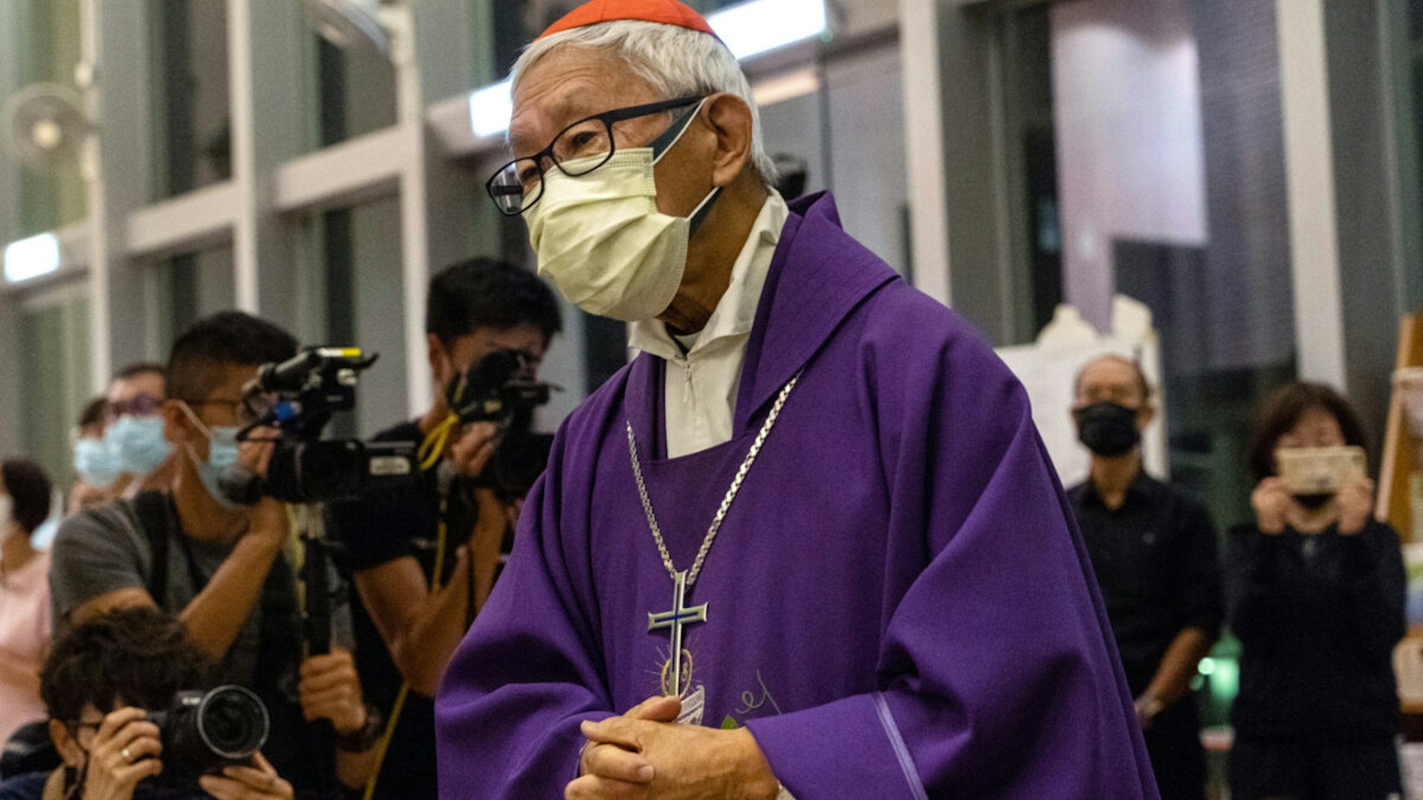 Joseph Zen, cardinal of the Holy Roman Church, arrives for a church service at St. Andrew's Parish in Hong Kong, China, on Friday, June 4, 2021