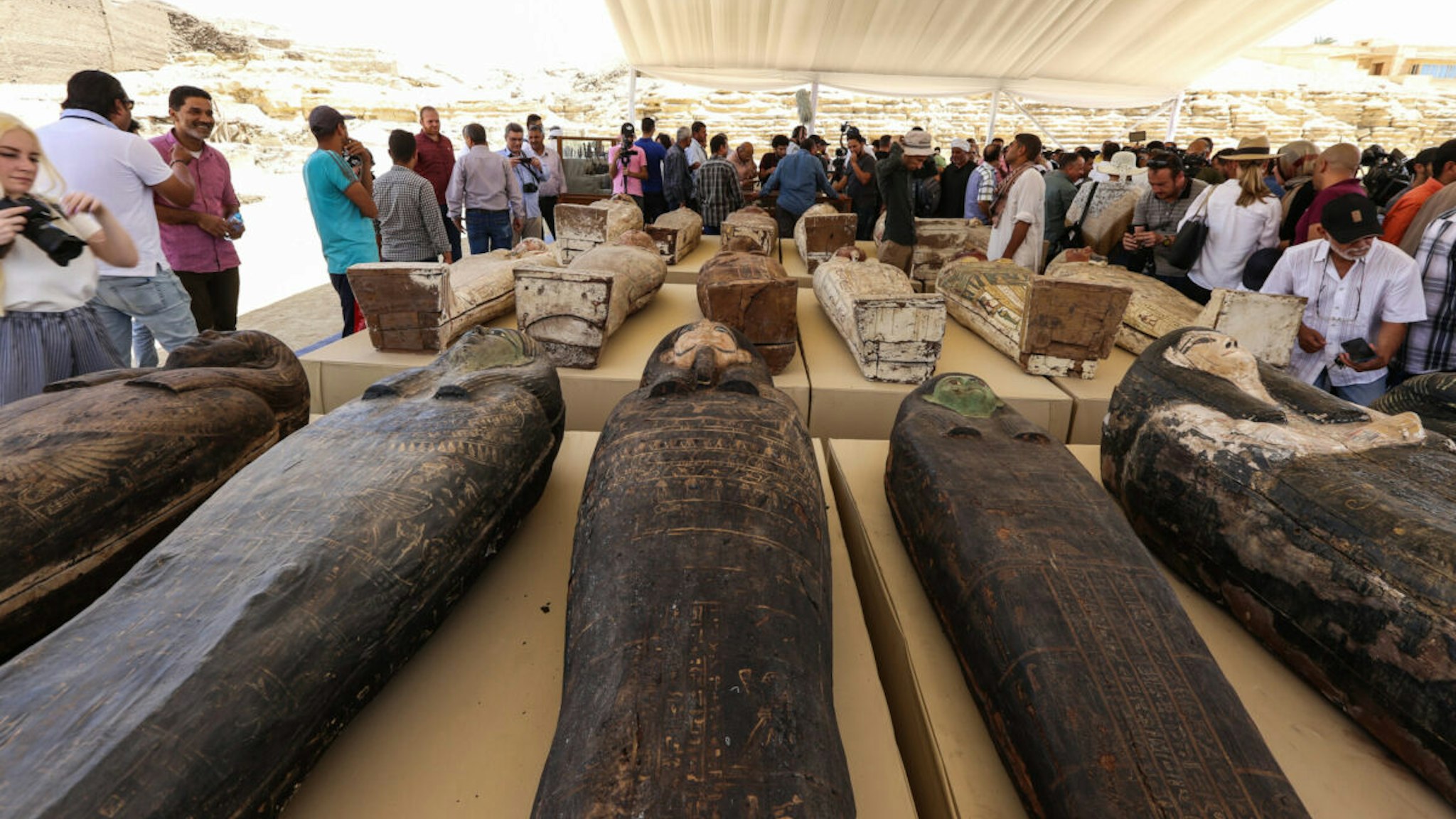 The discovery of mummy coffins dating back more than 2,500 years, which were revealed in the ancient Saqqara ring, during an official conference attended by Mustafa Al-Waziri, Secretary-General of the Supreme Council of Egyptian Antiquities, in an area on May 30, 2022 Giza Egypt