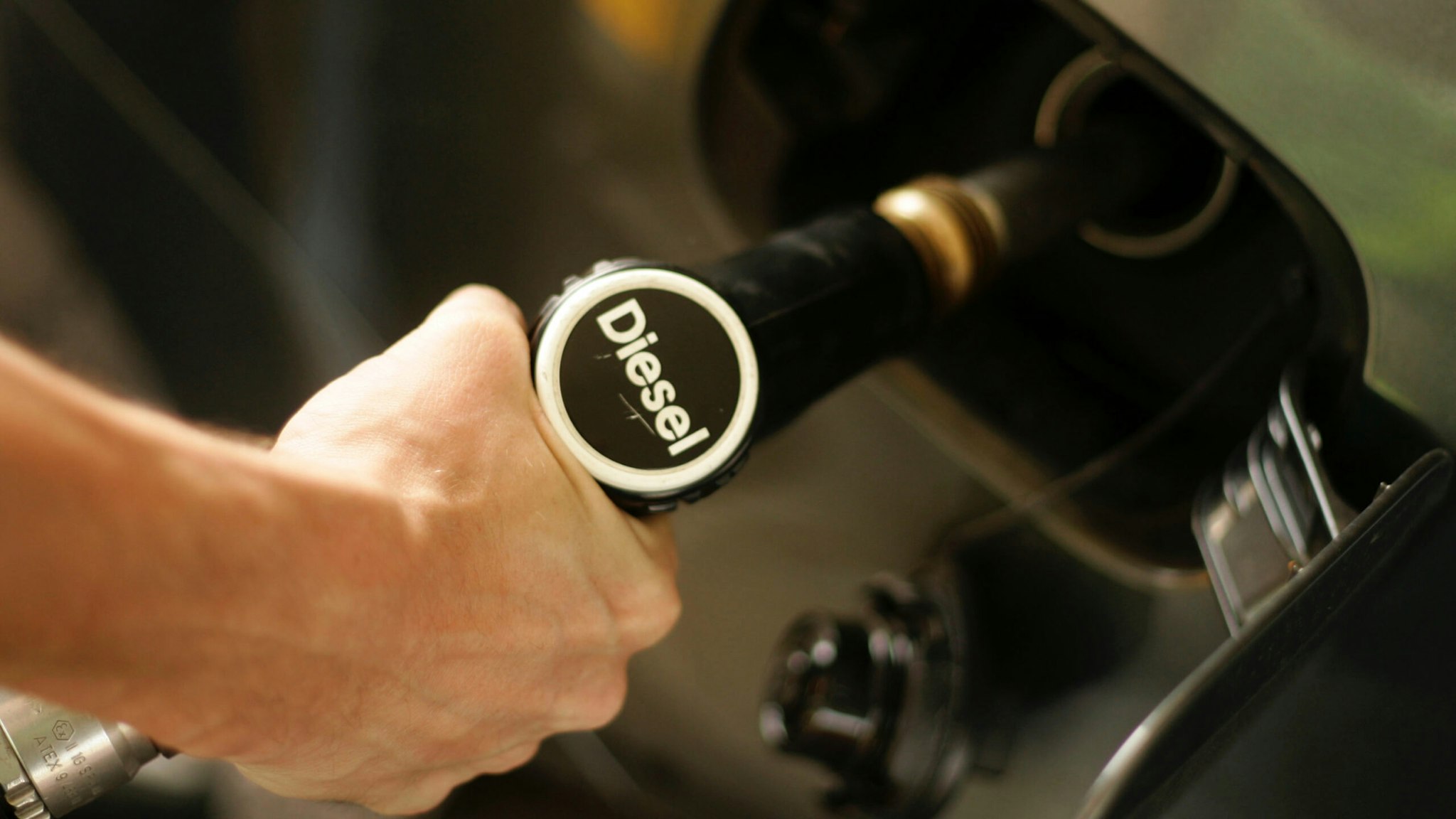 A driver fills up the tank of his car with diesel at a fuel station on May 29, 2008 in Luxembourg city.