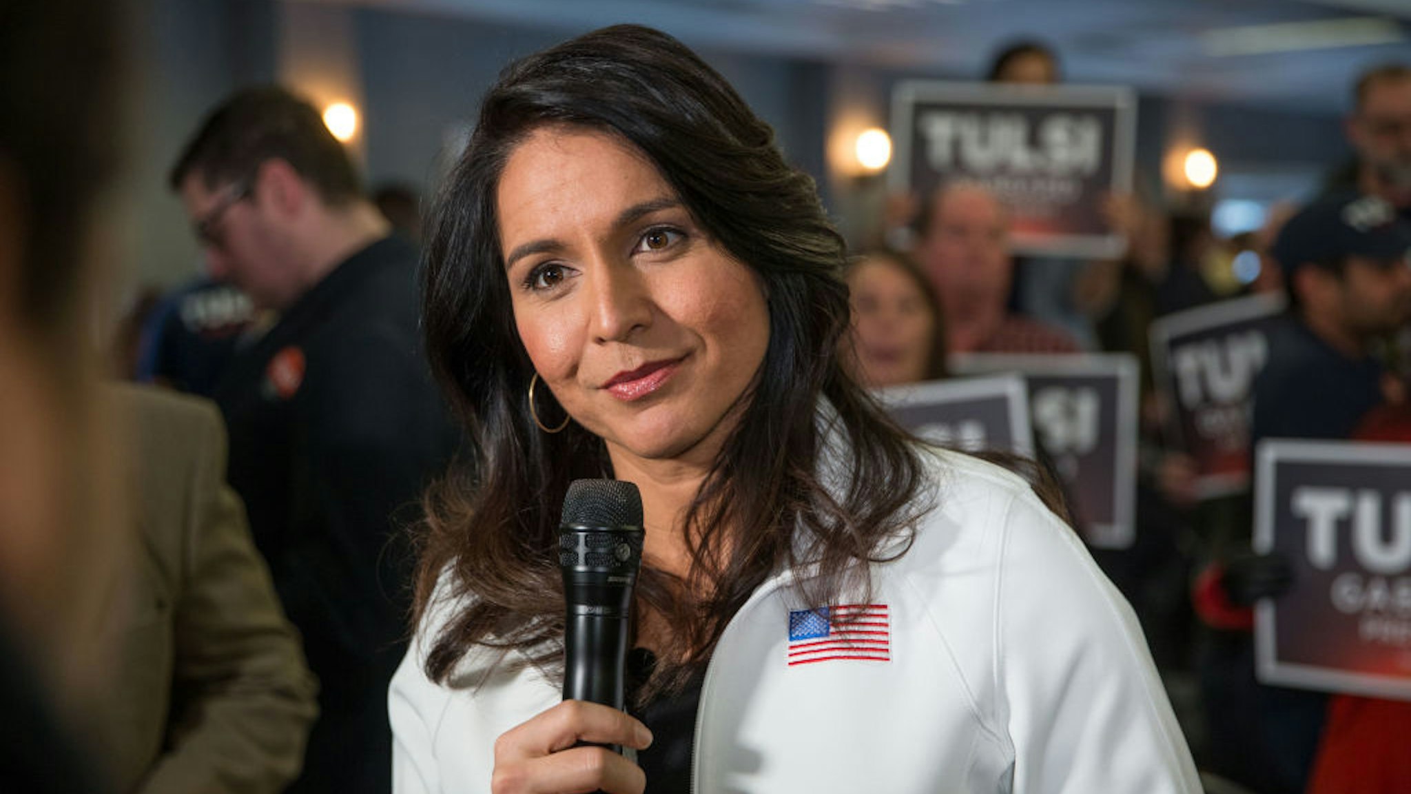 PORTSMOUTH, NH - FEBRUARY 09: Democratic presidential candidate Rep. Tulsi Gabbard (D-HI) answers media questions following a campaign event on February 9, 2020 in Portsmouth, New Hampshire. The first in the nation primary is on Tuesday, February 11. (Photo by Scott Eisen/Getty Images)