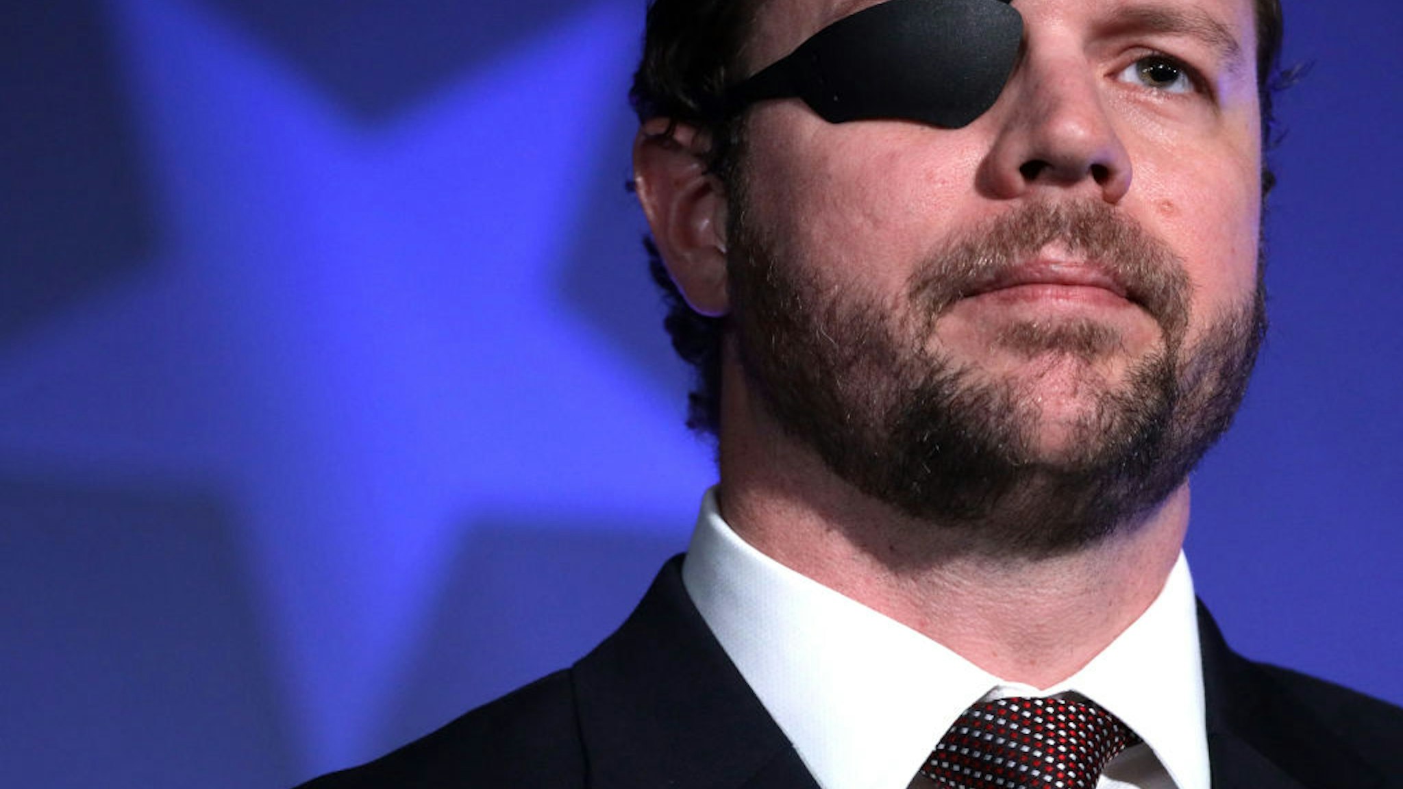 Rep. Dan Crenshaw called Tucker Carlson a "gross human being," but said he is not to blame for the Buffalo massacre
