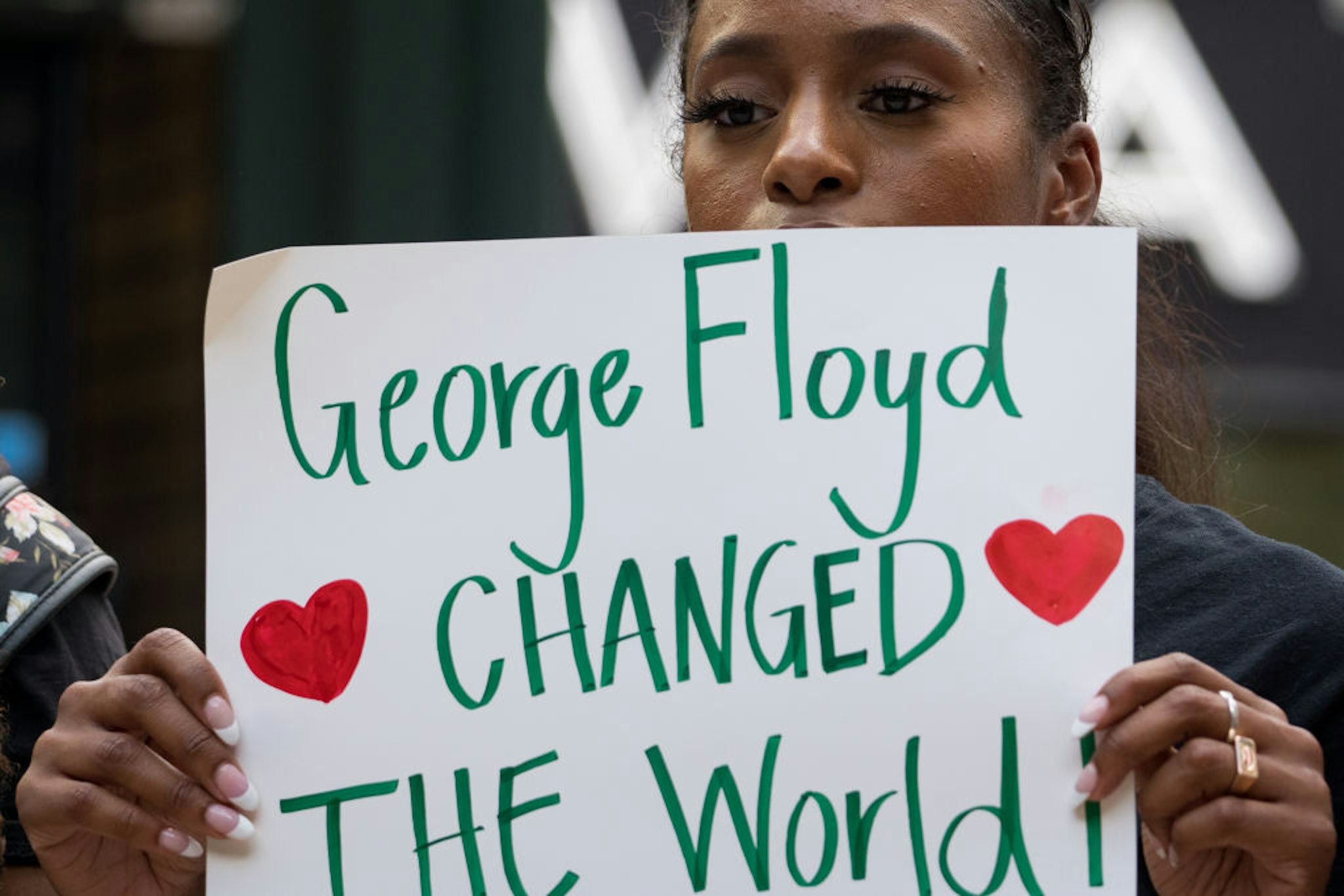 ATLANTA, GA - MAY 25: People gather to march and memorialize the life of George Floyd on the anniversary of his death on May 25, 2021 in Atlanta, Georgia. Floyd's death at the hands of Minneapolis police officer Derek Chauvin sparked protests and movements around the world. (Photo by Megan Varner/Getty Images)
