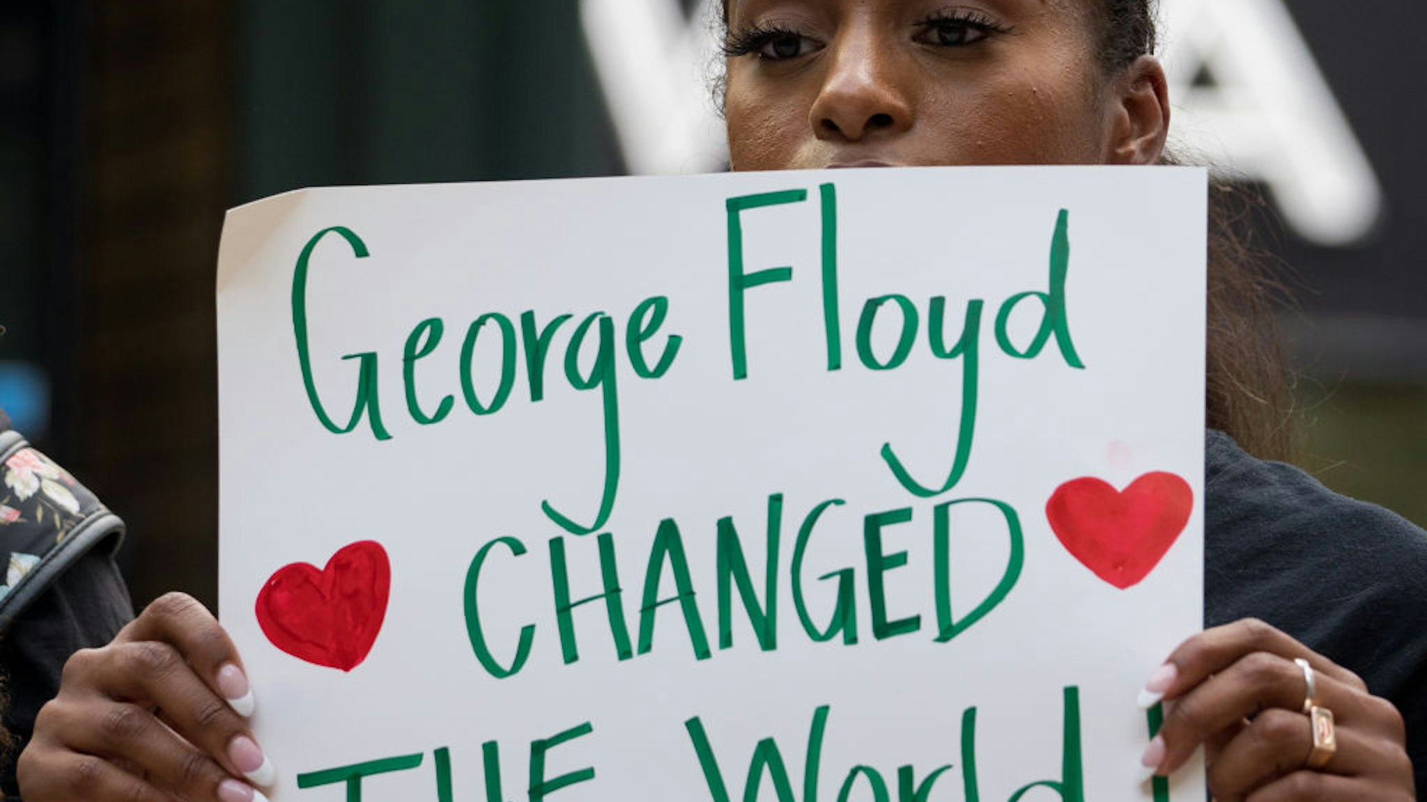 ATLANTA, GA - MAY 25: People gather to march and memorialize the life of George Floyd on the anniversary of his death on May 25, 2021 in Atlanta, Georgia. Floyd's death at the hands of Minneapolis police officer Derek Chauvin sparked protests and movements around the world. (Photo by Megan Varner/Getty Images)