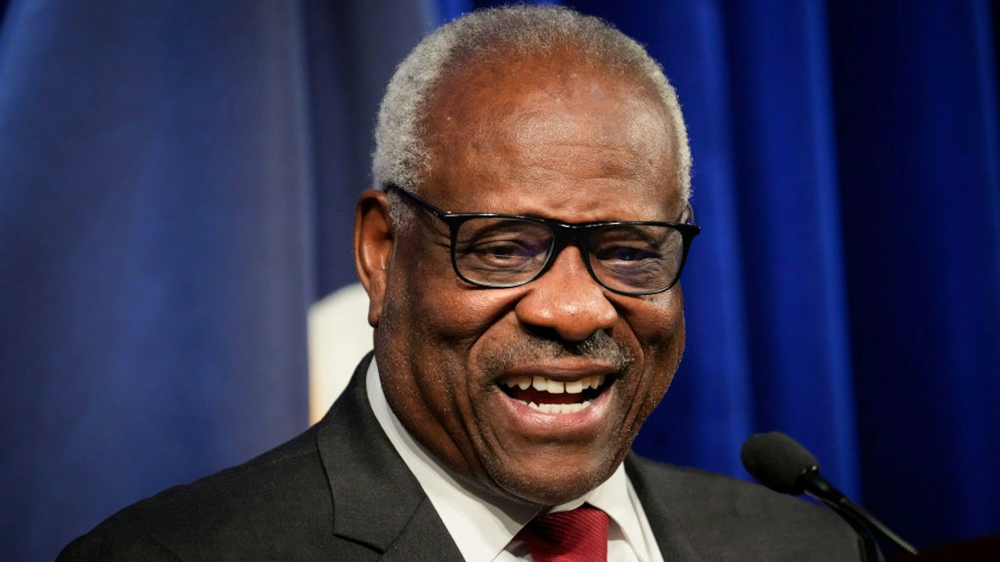 WASHINGTON, DC - OCTOBER 21: Associate Supreme Court Justice Clarence Thomas speaks at the Heritage Foundation on October 21, 2021 in Washington, DC. Clarence Thomas has now served on the Supreme Court for 30 years. He was nominated by former President George H. W. Bush in 1991 and is the second African-American to serve on the high court, following Justice Thurgood Marshall. (Photo by Drew Angerer/Getty Images)