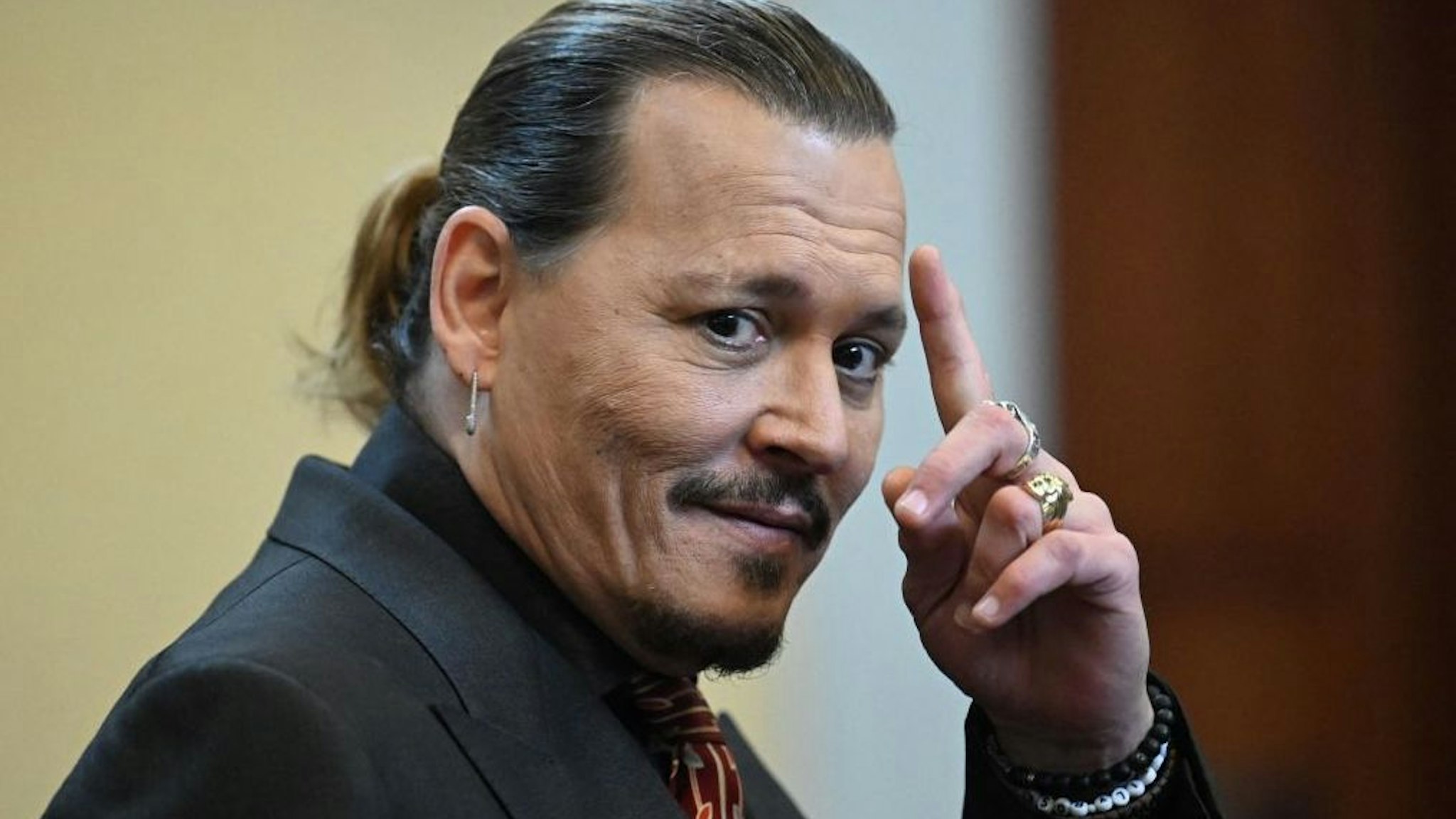 US actor Johnny Depp looks on during a hearing at the Fairfax County Circuit Courthouse in Fairfax, Virginia, on May 3, 2022.
