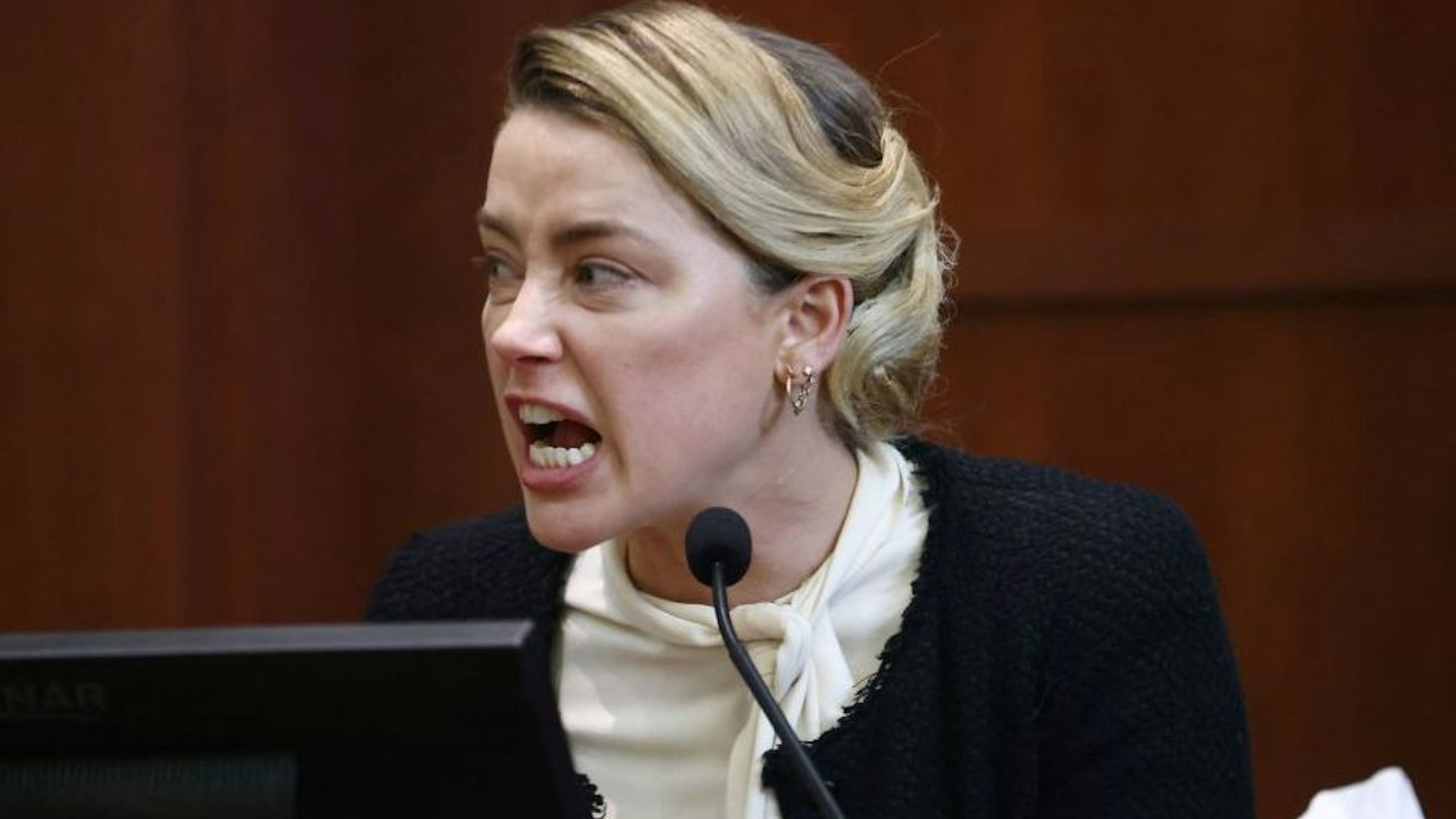 US actress Amber Heard testifies at the Fairfax County Circuit Courthouse in Fairfax, Virginia, on May 5, 2022.