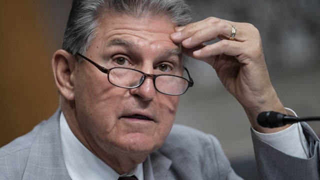 Senator Joe Manchin, a Democrat from West Virginia, speaks during a Senate Armed Services Committee hearing in Washington, D.C., U.S., on Tuesday, May 10, 2022. Russia's occupation of Ukraine threatens to weaken Moscow's power but leave it more determined to confront the US and allies and to wield nuclear threats, a top US spy said. Photographer: Sarah Silbiger/Bloomberg via Getty Images