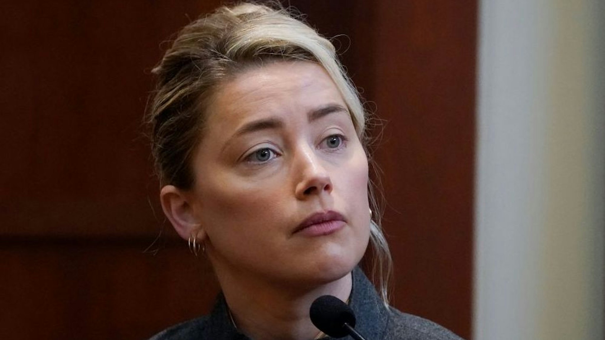 Actor Amber Heard testifies in the courtroom at the Fairfax County Circuit Courthouse in Fairfax, Virginia, on May 16, 2022.