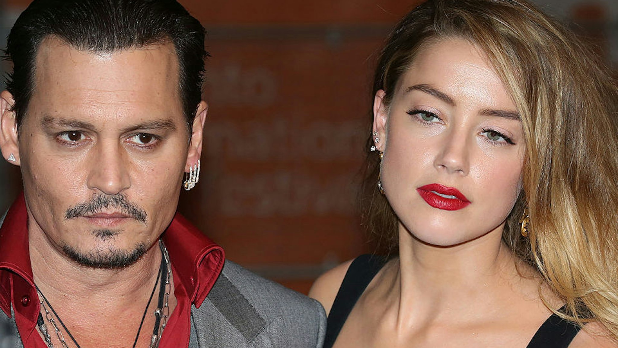 Johnny Depp and Amber Heard attend the 'Black Mass' premiere during the 2015 Toronto International Film Festival at The Elgin on September 14, 2015 in Toronto, Canada.