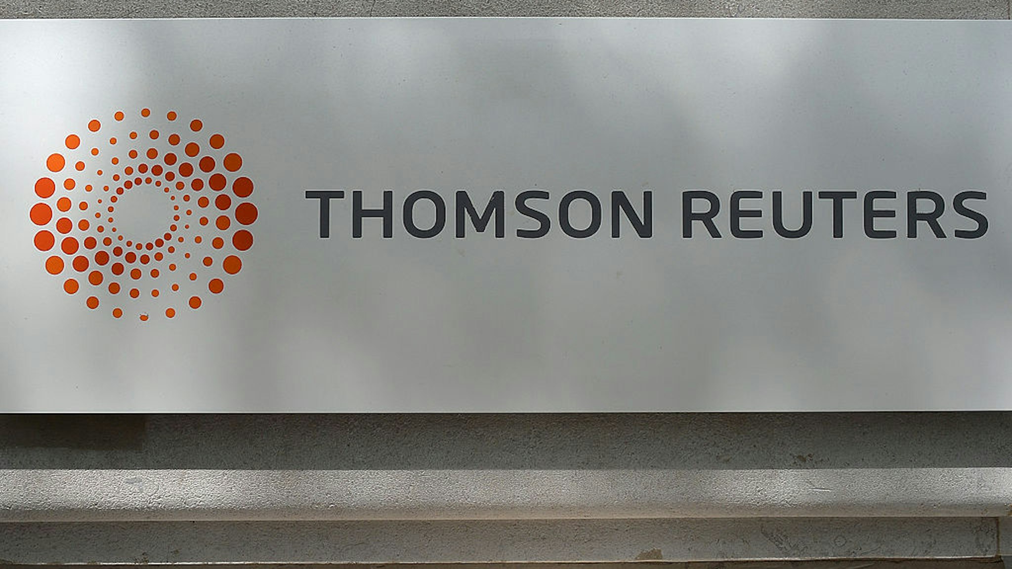 The corporate logo of Thomson Reuters is pictured on May 5, 2014 in Paris, France.