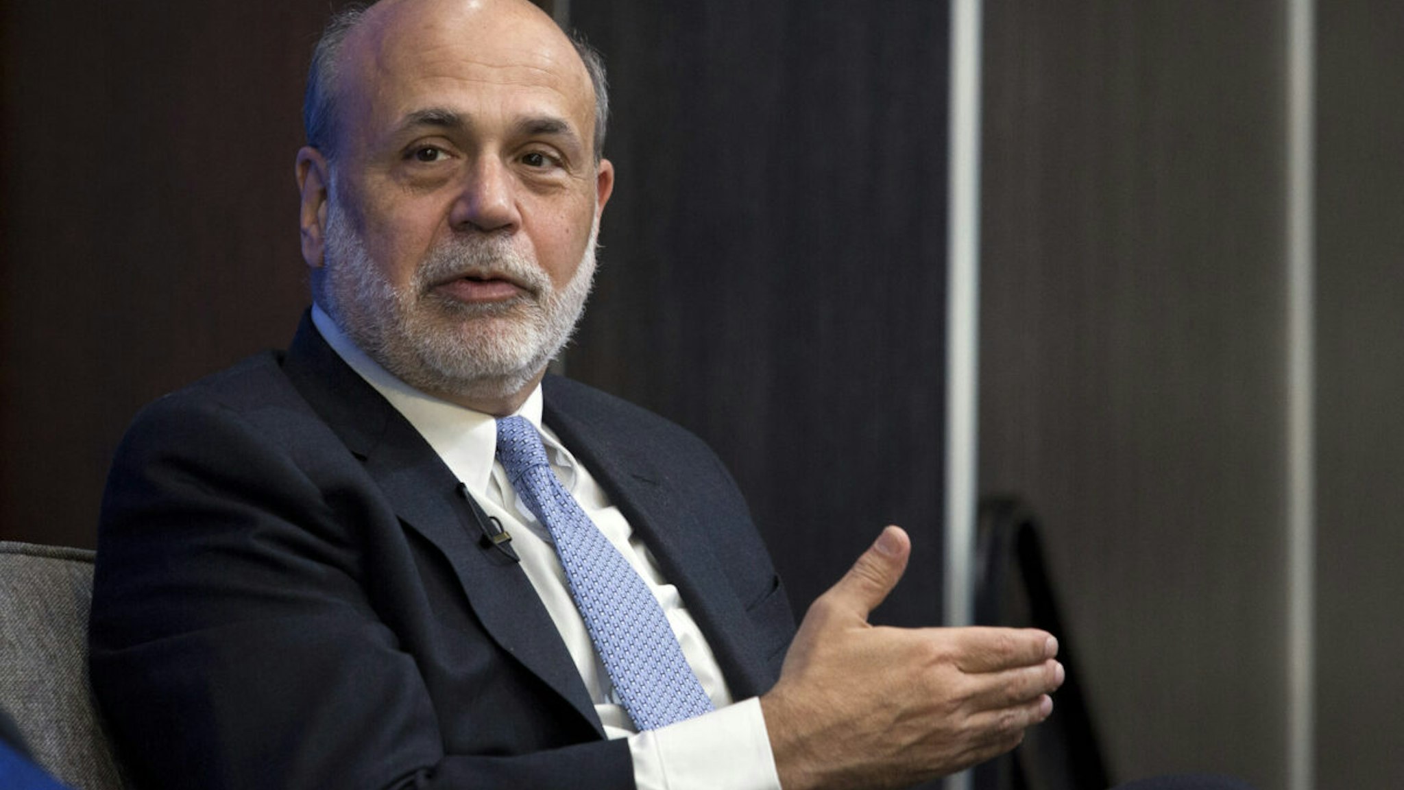 Ben Bernanke, former chairman of the Federal Reserve, speaks during an event with Yi Gang, deputy governor of the People's Bank of China (PBOC), not pictured, at the Brookings Institution in Washington, D.C., U.S., on Thursday, April 14, 2016. Yi said if the U.S. economy grows 2 percent this year he's confident that China's will grow by 6.5 to 7 percent. Photographer: Drew Angerer/Bloomberg via Getty Images