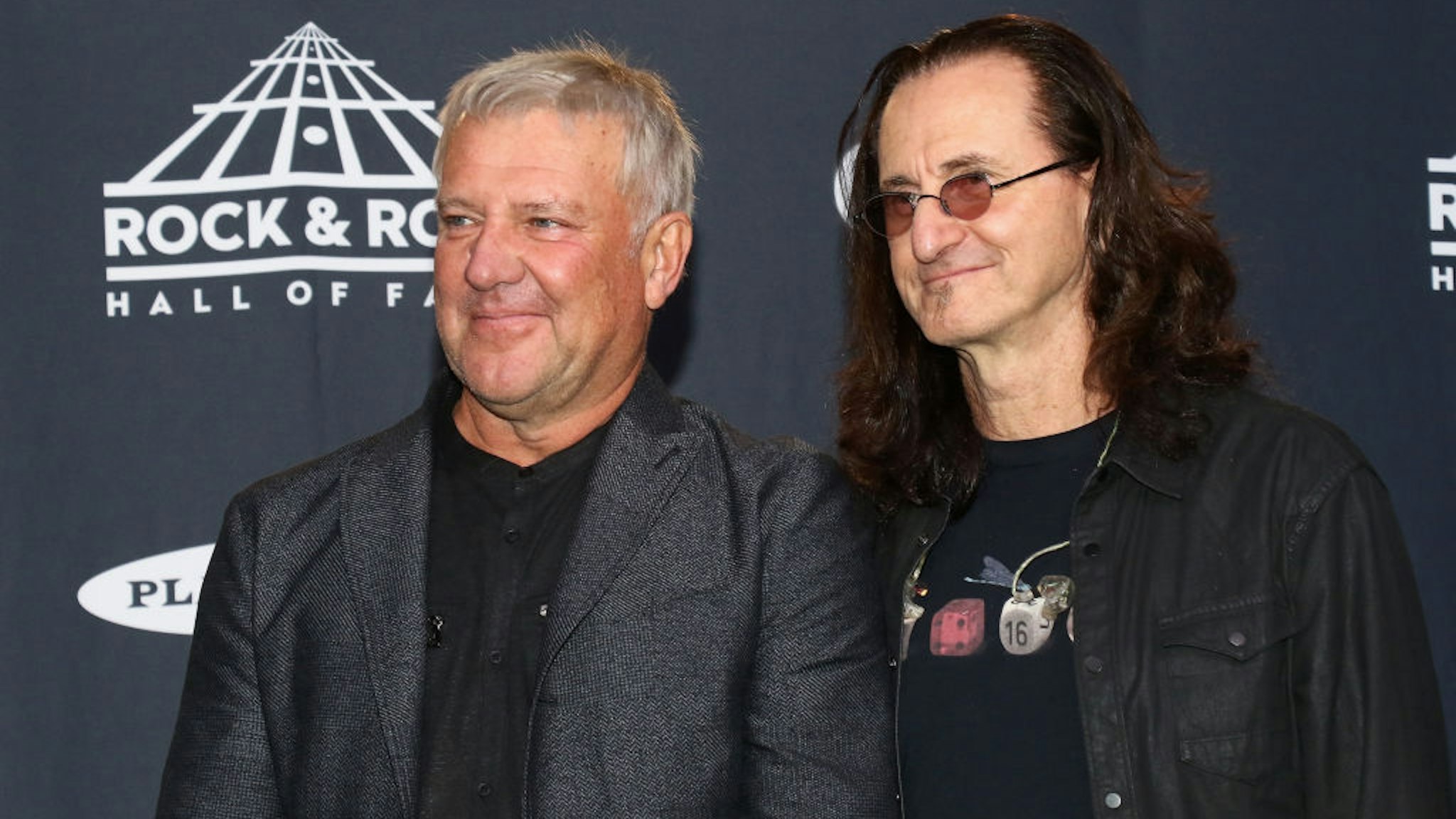 Alex Lifeson and Geddy Lee of Rush are out with their own brand of beer.