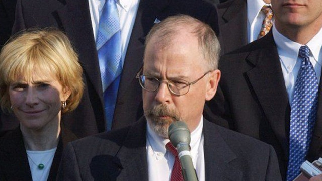 U.S. Attorney John Durham, center, outside federal court in New Haven, Conn., after the sentencing of former Gov. John Rowland. Durham will continue as special counsel in the investigation of the origins of the Trump-Russia inquiry, but is being asked to resign as U.S. attorney. (Bob MacDonnell/Hartford Courant/Tribune News Service via Getty Images)