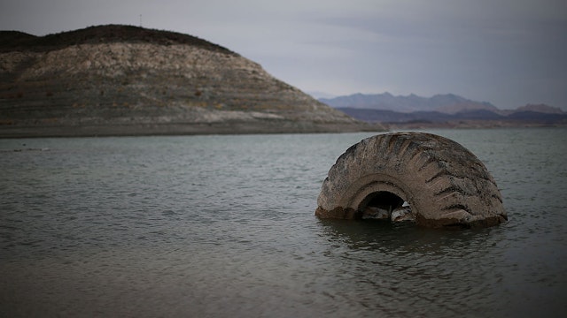 LAKE MEAD NRA, NV - MAY 13: A tractor tire sits in the waters of Lake Mead near Boulder Beach on May 13, 2015 in Lake Mead National Recreation Area, Nevada. As severe drought grips parts of the Western United States, Lake Mead, which was once the largest reservoir in the nation, has seen its surface elevation drop below 1,080 feet above sea level, its lowest level since the construction of the Hoover Dam in the 1930s.