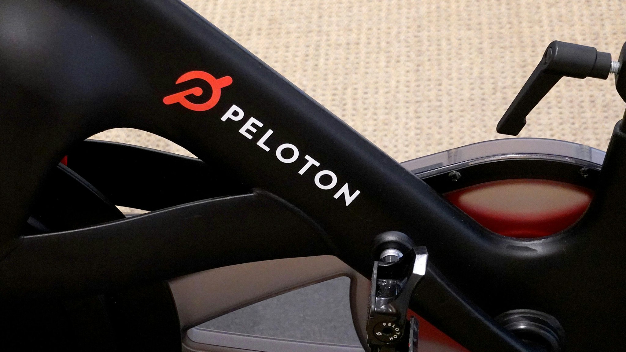 CORAL GABLES, FLORIDA - JANUARY 20: A Peloton bike on the showroom floor on January 20, 2022 in Coral Gables, Florida. Reports indicate that Peloton Interactive Inc is temporarily halting production of its bikes and treadmills after a drop in demand for the products.
