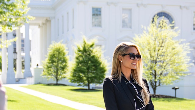 Actress and model Paris Hilton stands outside the White House on May 10, 2022 in Washington, DC. Hilton and her husband Carter Reum visited the White House to meet with Biden administration officials regarding child abuse laws.
