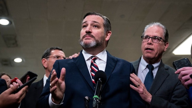 U.S. Sens. Ted Cruz (R-TX) and Mike Braun (R-IN) speak to the media during a dinner break in the Senate impeachment trial at the U.S. Capitol January 27, 2020 in Washington, DC.