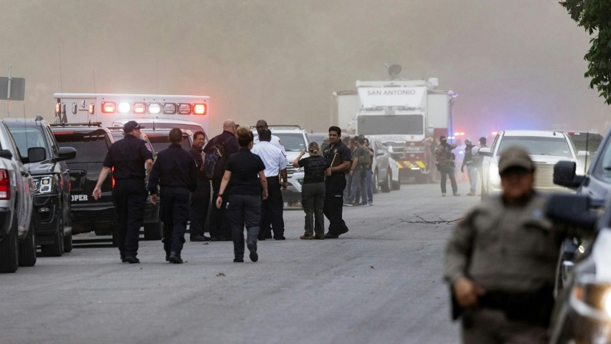 Law enforcement work the scene after a mass shooting at Robb Elementary School where 19 people, including 18 children, were killed on May 24, 2022 in Uvalde, Texas.