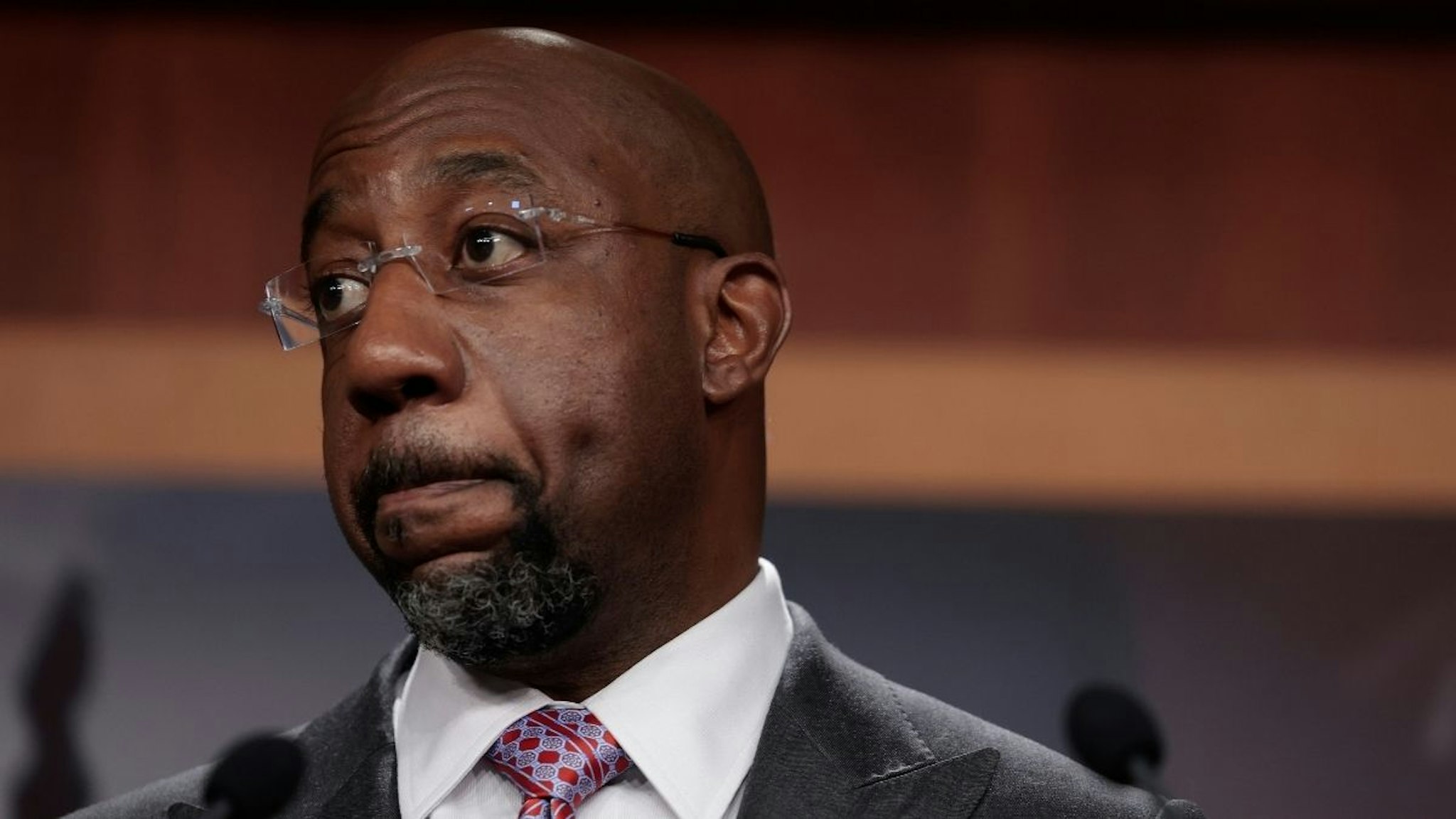 Sen. Raphael Warnock (D-GA) speaks at a news conference following a virtual weekly Senate Democratic Policy meeting at the U.S. Capitol Building on January 04, 2022 in Washington, DC.
