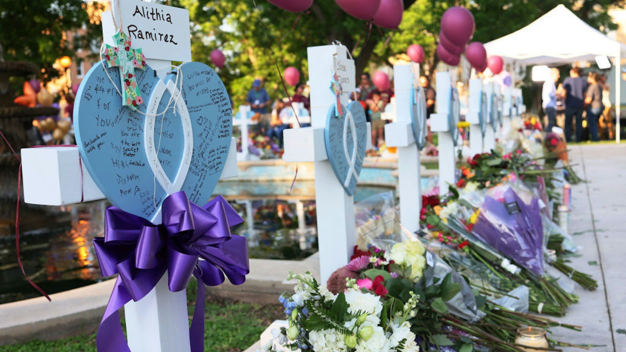 UVALDE, TEXAS - MAY 26: Memorials for victims of Tuesday's mass shooting at a Texas elementary school, in City of Uvalde Town Square on May 26, 2022 in Uvalde, Texas. Nineteen children and two adults were killed at Robb Elementary School after a man entered the school through an unlocked door and barricaded himself in a classroom where the victims were located. (Photo by Michael M. Santiago/Getty Images)