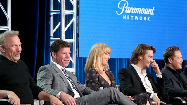 Actor Kevin Costner, producer/writer Taylor Sheridan, and actors Kelly Reilly, Luke Grimes, Cole Hauser, Kelsey Asbille, and Gil Birmingham of 'Yellowstone' speak onstage during the Paramount Network portion of the 2018 Winter Television Critics Association Press Tour at The Langham Huntington, Pasadena on January 15, 2018 in Pasadena, California.
