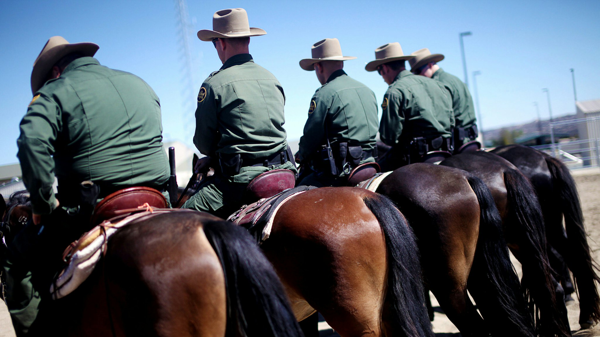 Border Patrol Agents listen to an instructor during training exercises at the Boulevard Customs and Border Protection Station in Boulevard, California on Tuesday, July 30, 2013. The U.S. Border Patrol plans to add asecondhorsepatrolunit for about ten horses at a new facility in rural Boulevard, about 60 miles east of San Diego, near the Mexicanborder in September. The border patrol has long relied on horses to police theborder because the animals are less expensive and last longer than vehicles