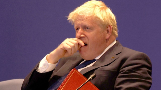 KIGALI, RWANDA - JUNE 25: British Prime Minister Boris Johnson yawns during the Leaders' Retreat executive session on the sidelines of day six of the 2022 Commonwealth heads of Government meeting at the Intare Conference centre on June 25, 2022 in Kigali, Rwanda. Leaders of Commonwealth countries meet every two years for the Commonwealth Heads of Government Meeting (CHOGM), hosted by different member countries on a rotating basis. Since 1971, a total of 24 meetings have been held, with the most recent being in the UK in 2018.
