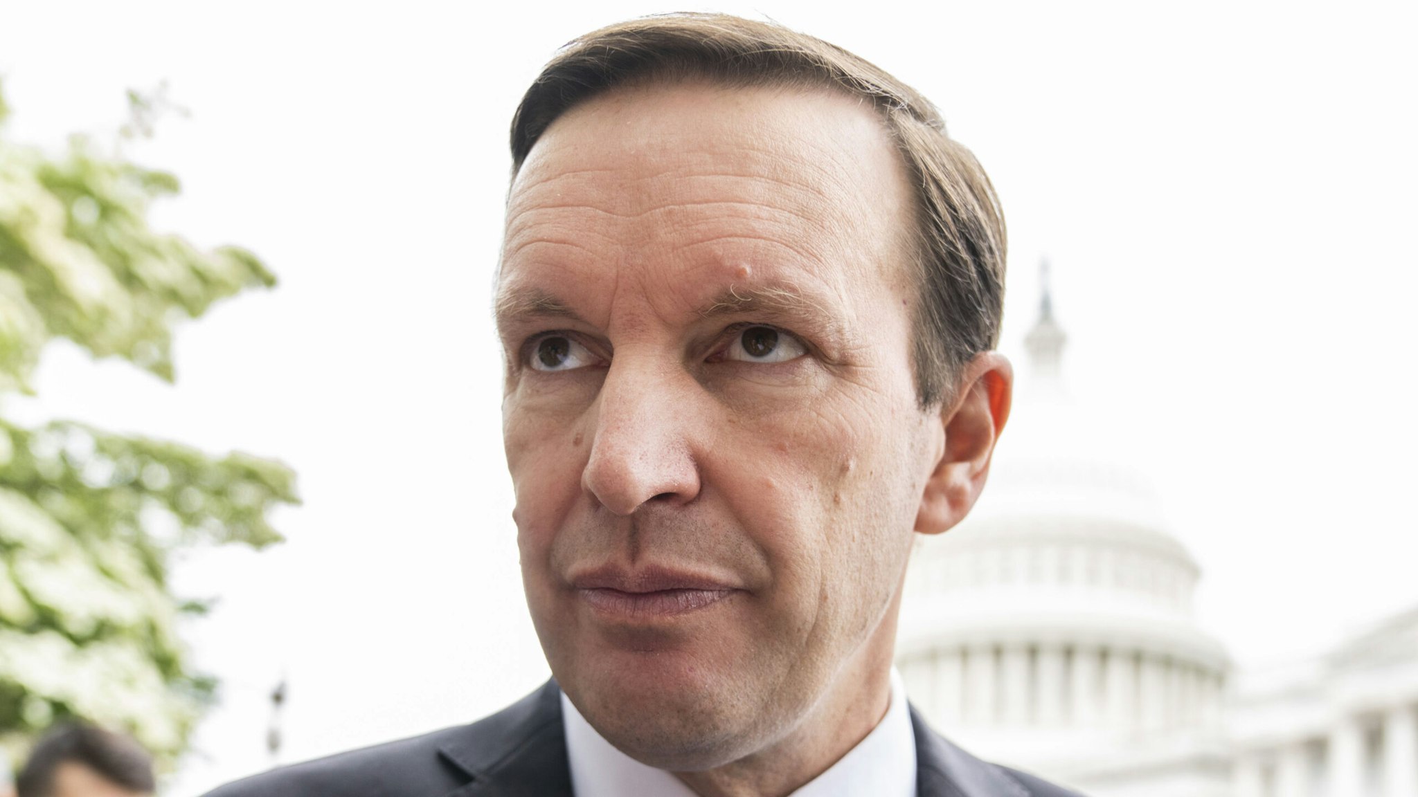 UNITED STATES - MAY 26: Sen. Chris Murphy, D-Conn., talks with reporters during rally outside the U.S. Capitol to demand the Senate take action on gun safety on Thursday, May 26, 2022, in the wake of the Robb Elementary School shooting in Texas.