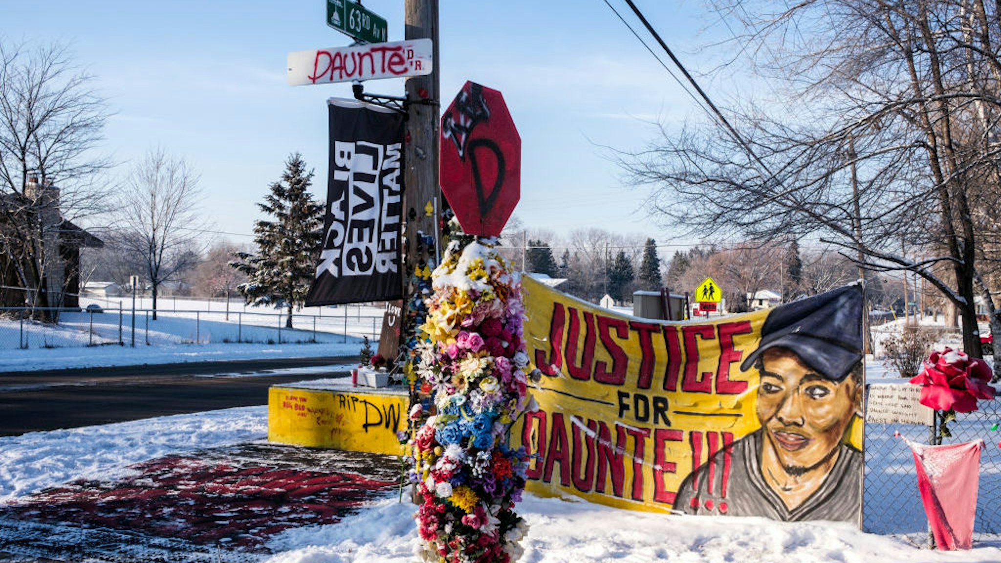 MINNEAPOLIS, MN - DECEMBER 08: A general view of a memorial for Daunte Wright, which stands at the intersection where he was killed, on December 8, 2021 in Minneapolis, Minnesota. Opening statements begin today in the trial of former Brooklyn Center police officer Kim Potter, who is charged with manslaughter in the April 2021 shooting death of Daunte Wright. Potter claims she thought she was using her taser when she shot Wright with her handgun. (Photo by Stephen Maturen/Getty Images)