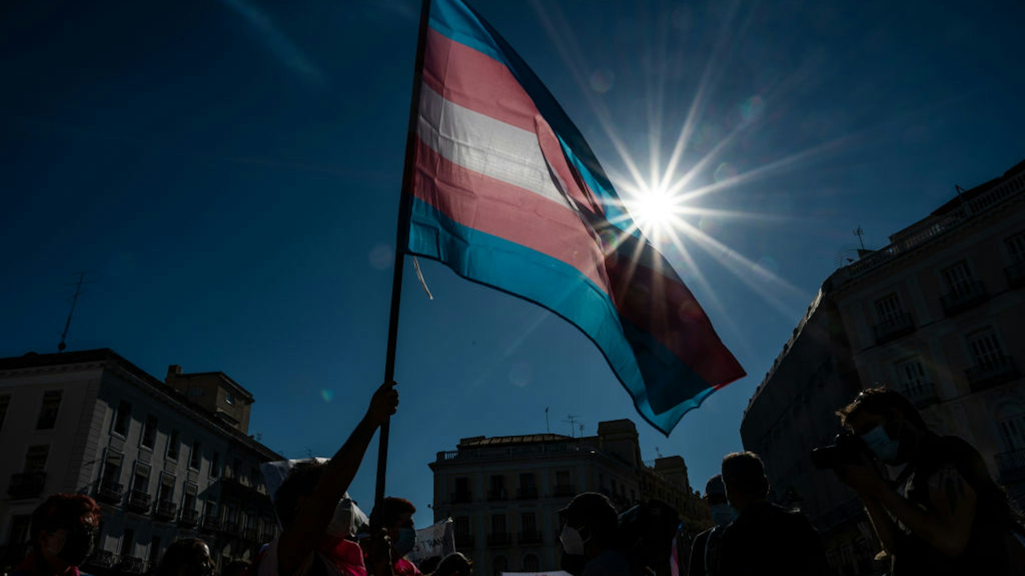 MADRID, SPAIN - 2020/07/04: Demonstrator waving the Trans flag attends a protest where Trans community demand a state law that will guarantee gender self-determination. The protest coincides with the Pride celebrations that are taking place this week. (Photo by Marcos del Mazo/LightRocket via Getty Images)