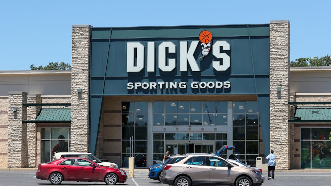 Cars are seen parked in front of a Dick's Sporting Goods store at Monroe Marketplace in Pennsylvania.