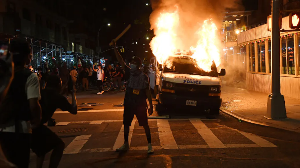 Biden DOJ Wants Reduced Sentence For Leftist Lawyers Who Used Molotov Cocktails To Target Police Van During Protest