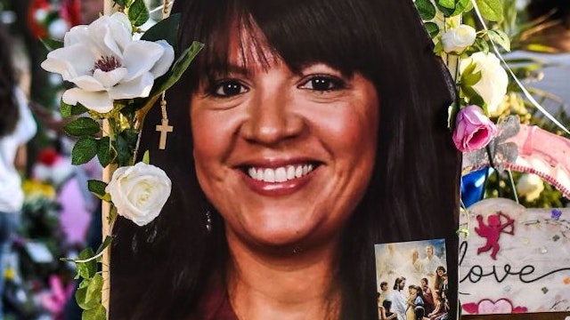 A photo of Eva Mireles, 44, who died in the mass shooting, is placed at a makeshift memorial at Robb Elementary School in Uvalde, Texas, on May 30, 2022.