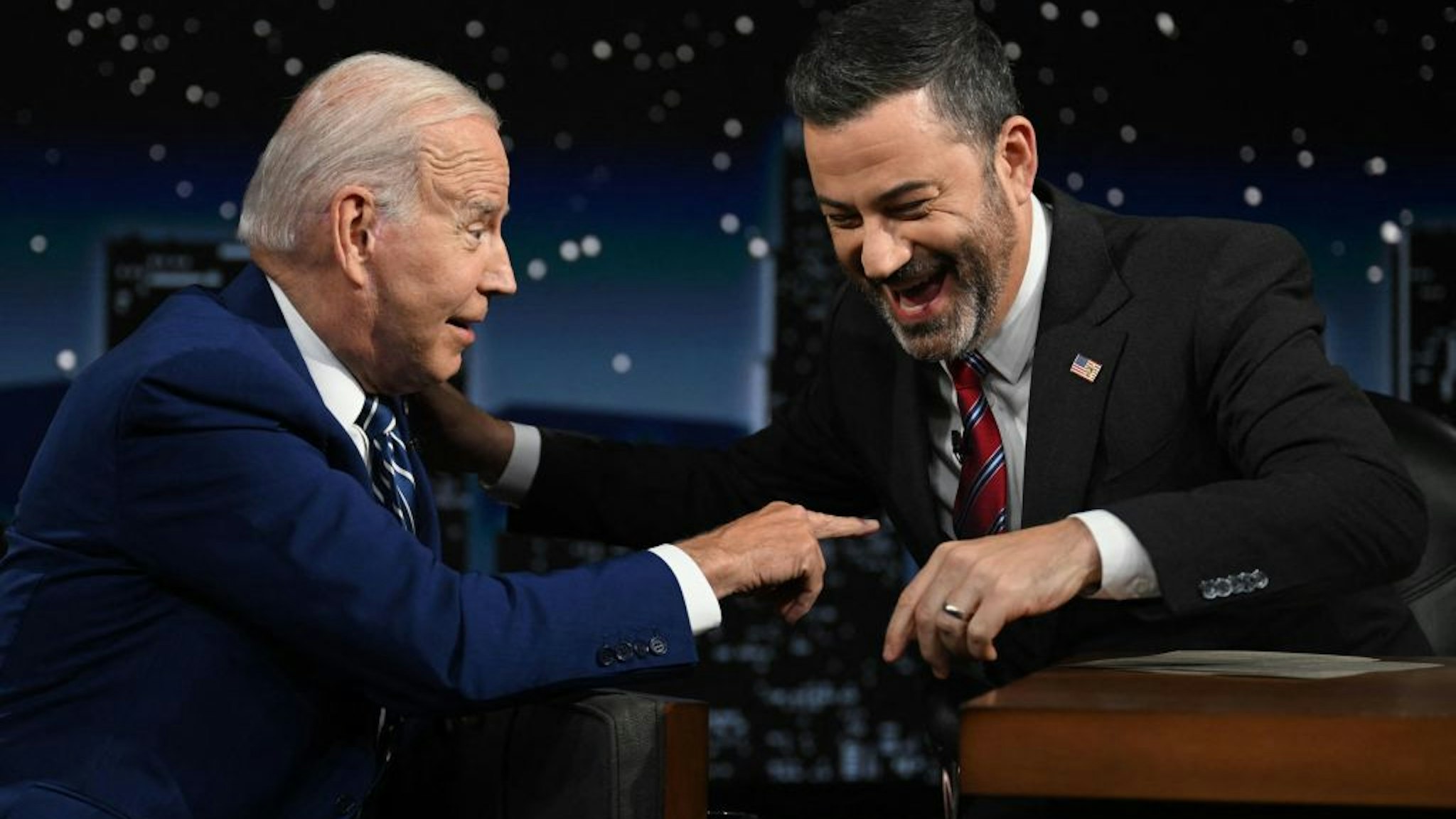 TOPSHOT - US President Joe Biden speaks with host Jimmy Kimmel as he makes his first in-person appearance on "Jimmy Kimmel Live!" during his Los Angeles visit to attend the Summit of the Americas, in Hollywood, California, June 8, 2022. (Photo by Jim WATSON / AFP) (Photo by JIM WATSON/AFP via Getty Images)