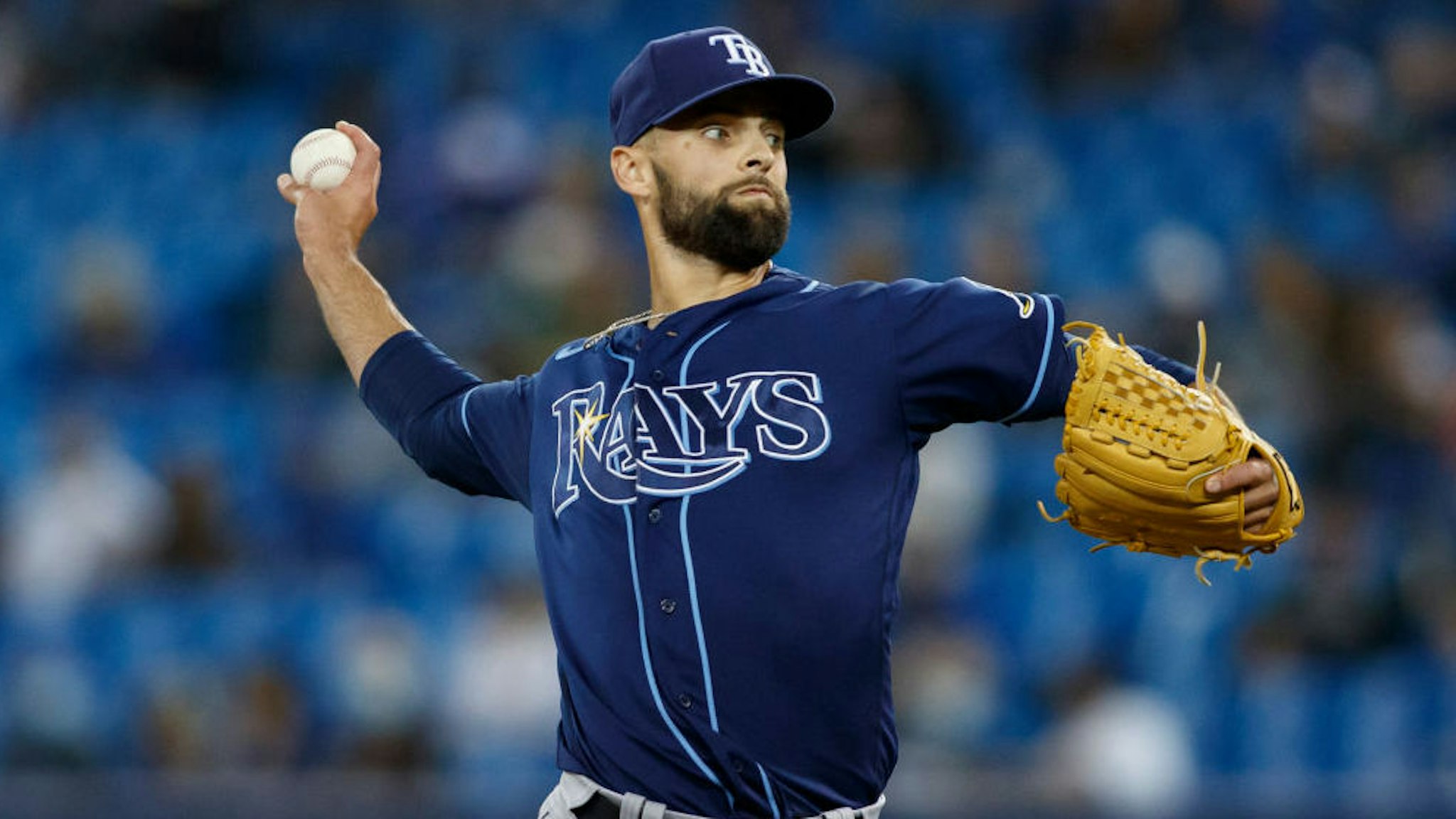 Nick Anderson #70 of the Tampa Bay Rays pitches in the seventh inning of their MLB game against the Tampa Bay Rays at Rogers Centre on September 13, 2021 in Toronto, Ontario.