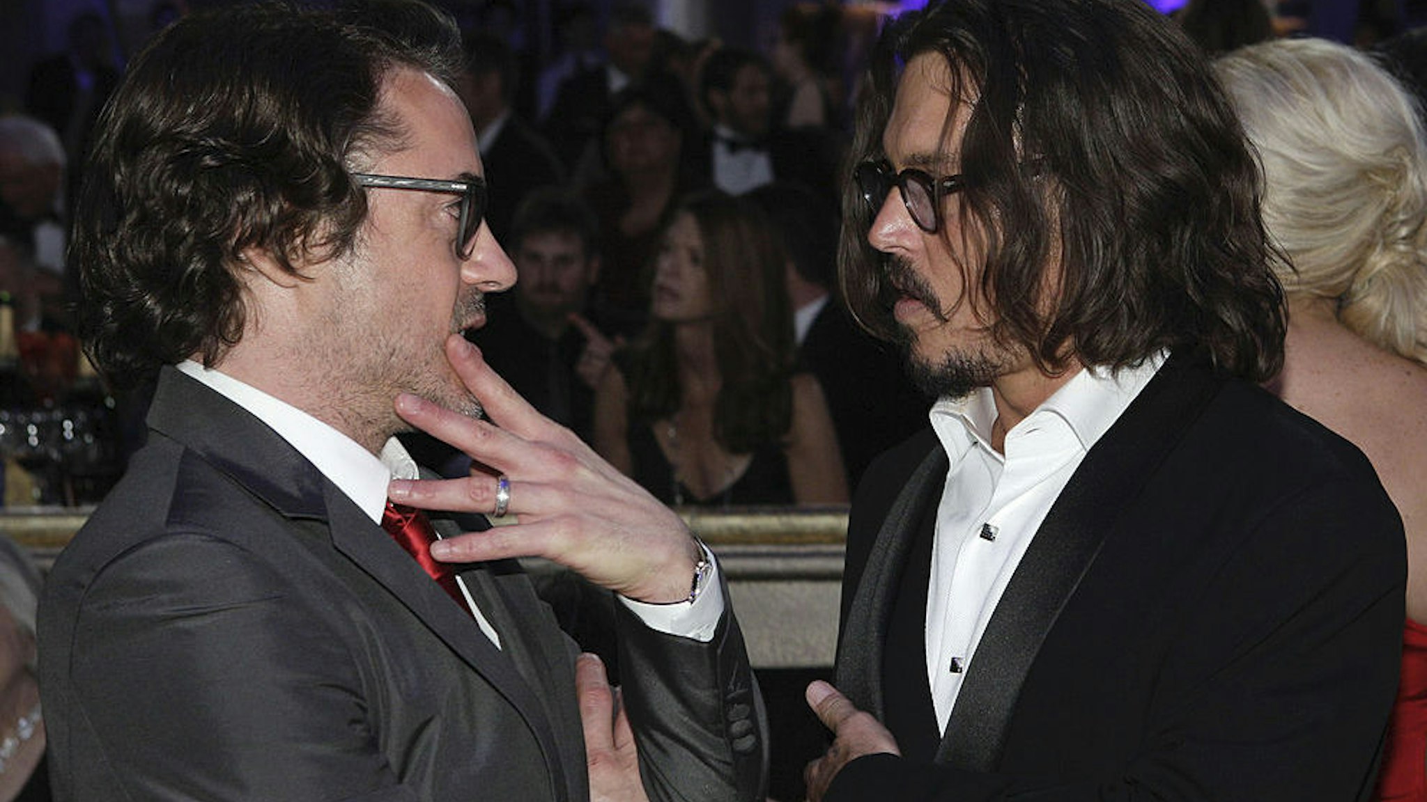 Pictured: (l-r) Robert Downey Jr., Johnny Depp during the 68th Annual Golden Globe Awards held at the Beverly Hilton Hotel on January 16, 2011
