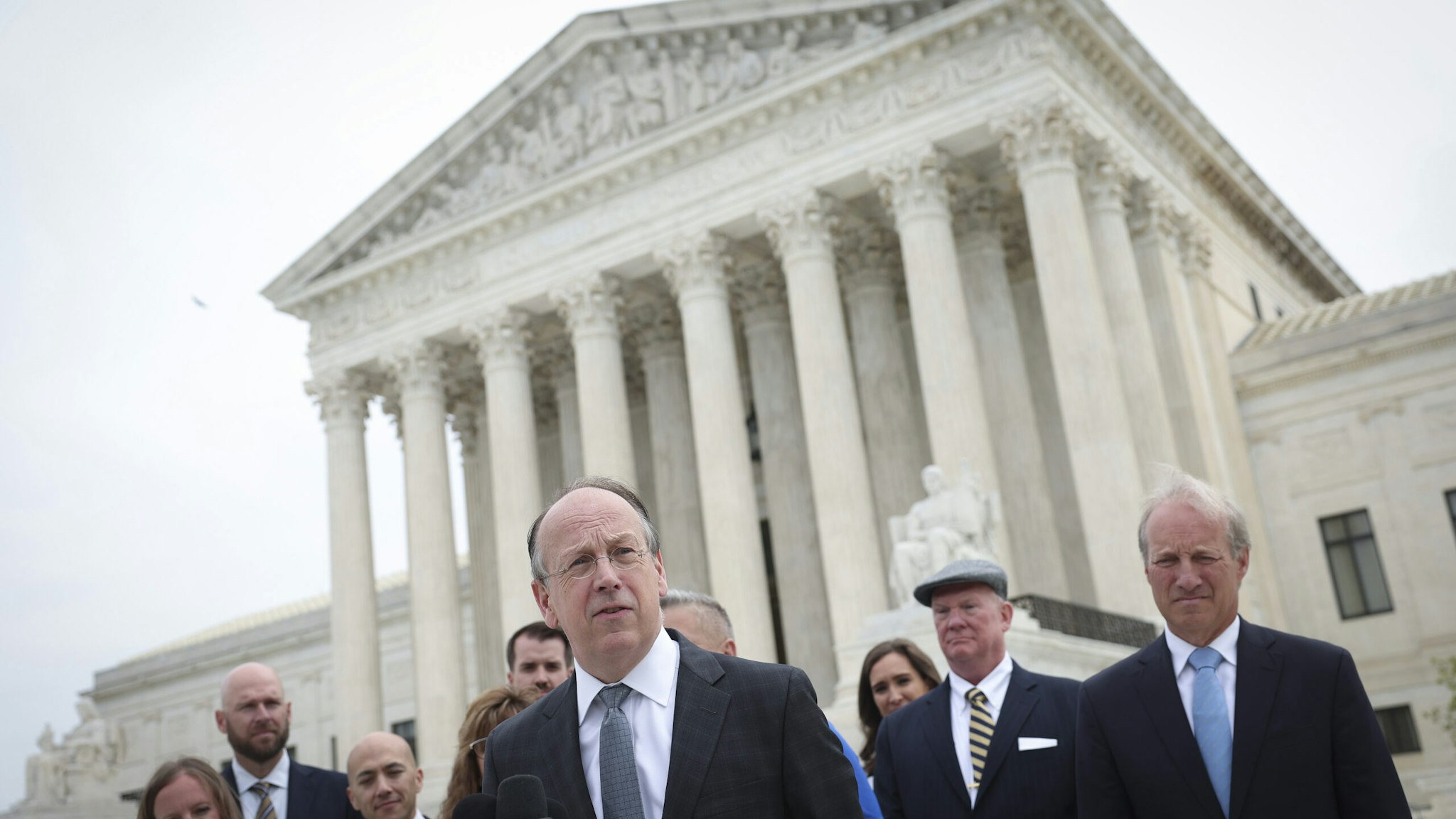 Attorney Paul Clement answers questions outside the U.S. Supreme Court after arguing the case of former Bremerton High School assistant football coach Joe Kennedy on April 25, 2022 in Washington, DC. Kennedy was terminated from his job by Bremerton public school officials in 2015 after refusing to stop his on-field prayers after football games.
