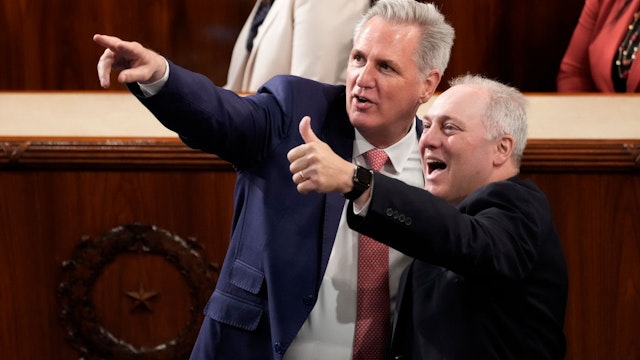 WASHINGTON, DC - MAY 17: House Minority Leader Kevin McCarthy (R-CA) (L) and House Minority Whip Steve Scalise (R-LA) point out friends as they await the arrival of Greek Prime Minister Kyriakos Mitsotakis in the House Chamber of the U.S. Capitol on May 17, 2022 in Washington, DC. A day earlier, Mitsotakis held bilateral meetings with President Joe Biden where the two leaders discussed Greek-U.S. relations and their support of the people of Ukraine in the face of invasion by Russia. (Photo by Drew Angerer/Getty Images)