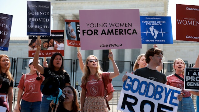 WASHINGTON, DC - JUNE 15: Anti-abortion protesters demonstrate in front of the U.S. Supreme Court Building on June 15, 2022 in Washington, DC. The court is set to announce a number of high-profile decisions before the end of June. (Photo by Joe Raedle/Getty Images)