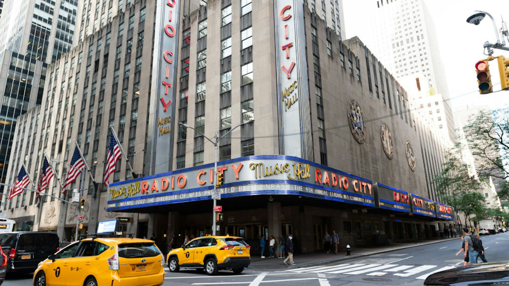 NEW YORK, NEW YORK - JUNE 20: A view outside Radio City Music Hall during the 4th annual NFT.NYC conference on June 20, 2022 in New York City. The four-day event will feature 1,500 speakers from the crypto and NFT space and will host over 14,000 attendees. (Photo by Noam Galai/Getty Images)