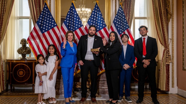 WASHINGTON, DC - JUNE 21: Congresswoman-elect Mayra Flores (R-TX) stands with her family and Speaker of the House Nancy Pelosi (D-CA) for a portrait after being sworn-in on June 21, 2022 in Washington, DC. Mayra Flores was sworn in today on the House Floor to fill the 34th district seat of Texas for the remainder of the 117th Congress. (Photo by Brandon Bell/Getty Images)