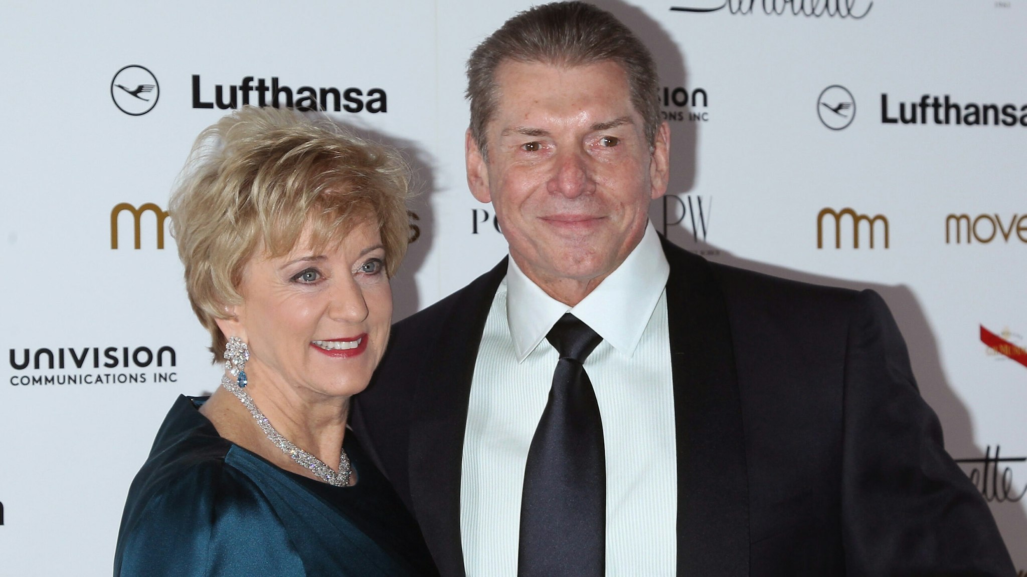 WWE boss Vince McMahon, shown here with wife Linda McMahon, stepped down as CEO amid a messy sex scandal