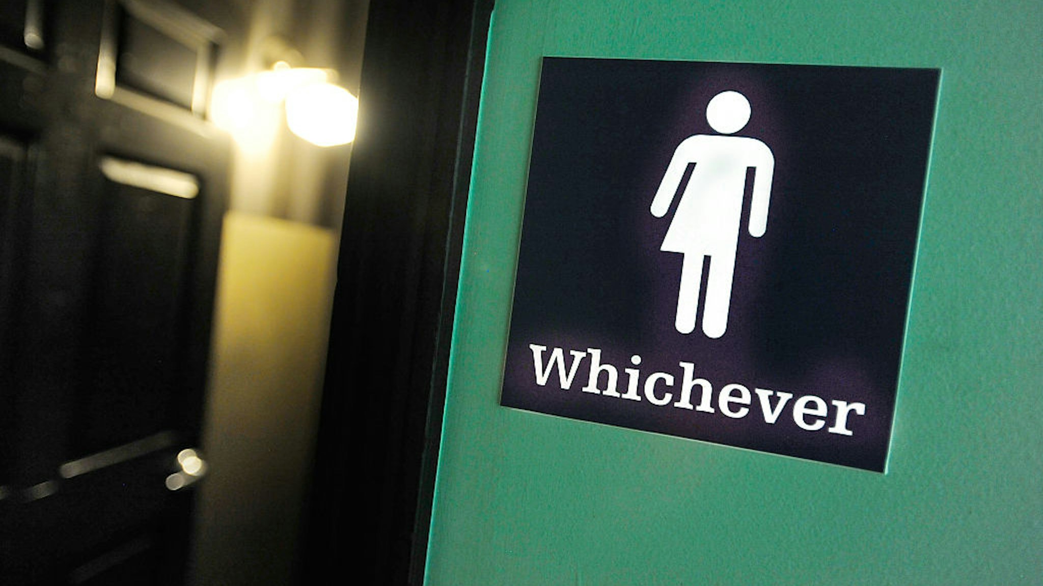 DURHAM, NC - MAY 11: A gender neutral sign is posted outside a bathrooms at Oval Park Grill on May 11, 2016 in Durham, North Carolina. Debate over transgender bathroom access spreads nationwide as the U.S. Department of Justice countersues North Carolina Governor Pat McCrory from enforcing the provisions of House Bill 2 (HB2) that dictate what bathrooms transgender individuals can use. (Photo by Sara D. Davis/Getty Images)