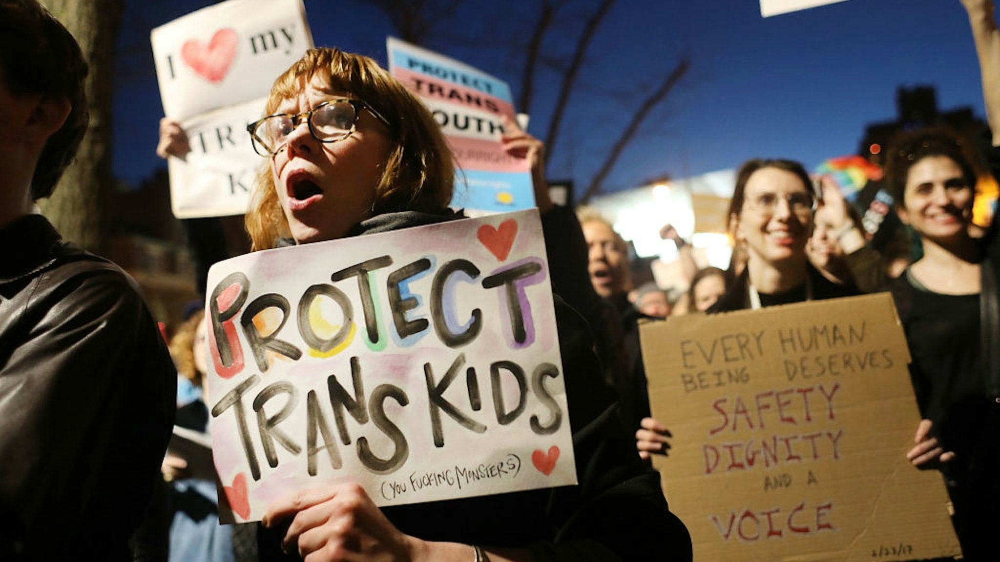 NEW YORK, NY - FEBRUARY 23: Hundreds protest a Trump administration announcement this week that rescinds an Obama-era order allowing transgender students to use school bathrooms matching their gender identities, at the Stonewall Inn on February 23, 2017 in New York City. Activists and members of the transgender community gathered outside the historic LGTB bar to denounce the new policy. (Photo by Spencer Platt/Getty Images)