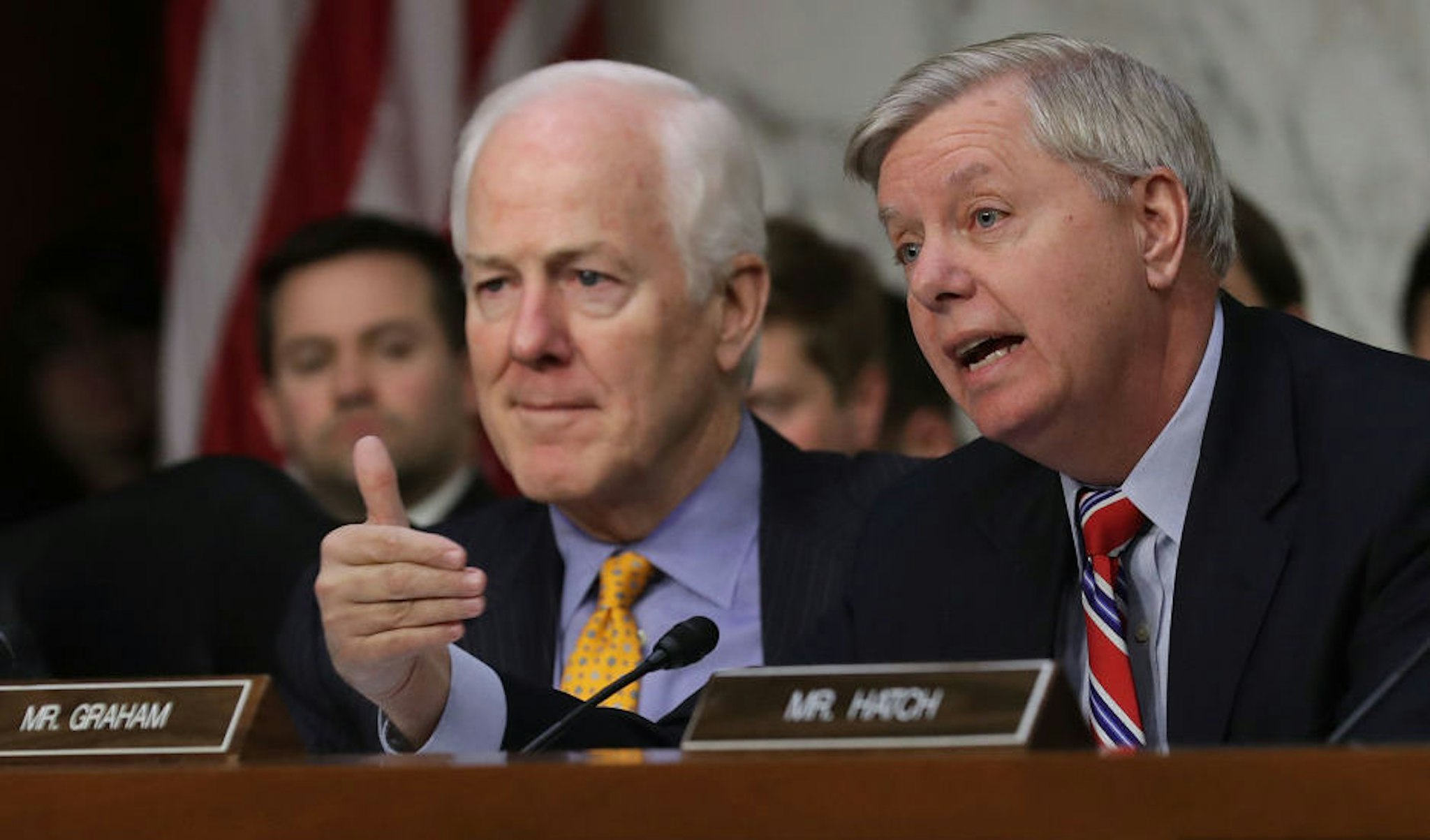 Senate Judiciary Committee member Sen. Lindsey Graham (R-SC) (R) delivers an opening statement with Sen. John Cornyn (R-TX) during Judge Neil Gorsuch's Supreme Court confirmation hearing in the Hart Senate Office Building on Capitol Hill March 20, 2017 in Washington, DC.